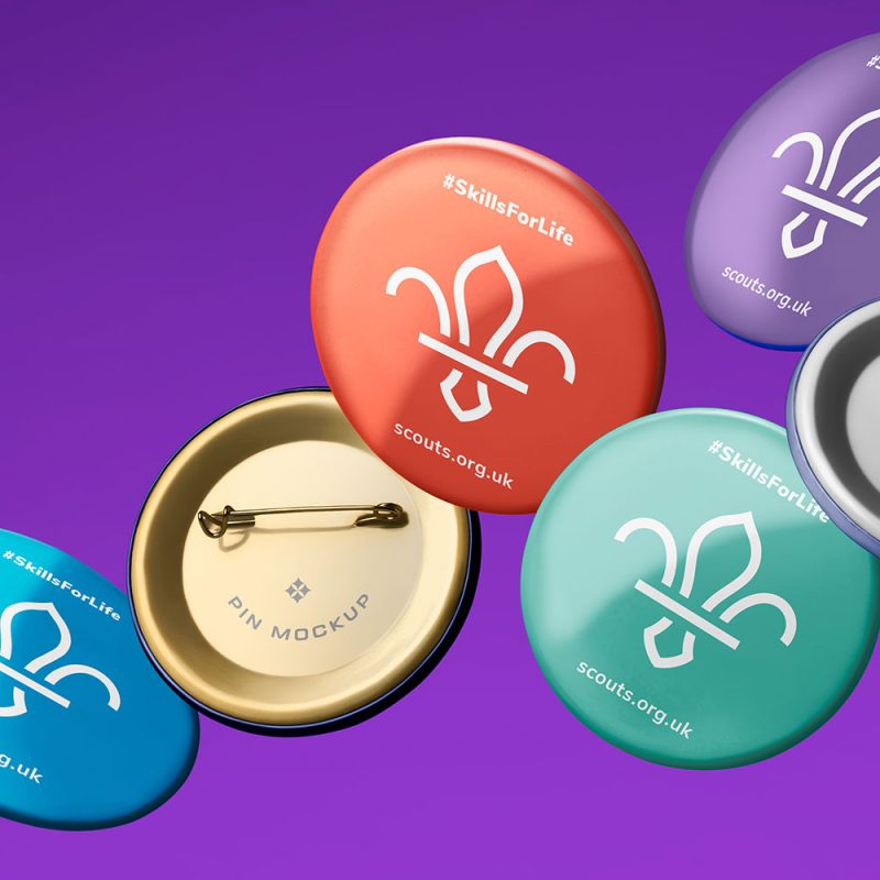 Branded merchandise scouts buttons with bright purple background